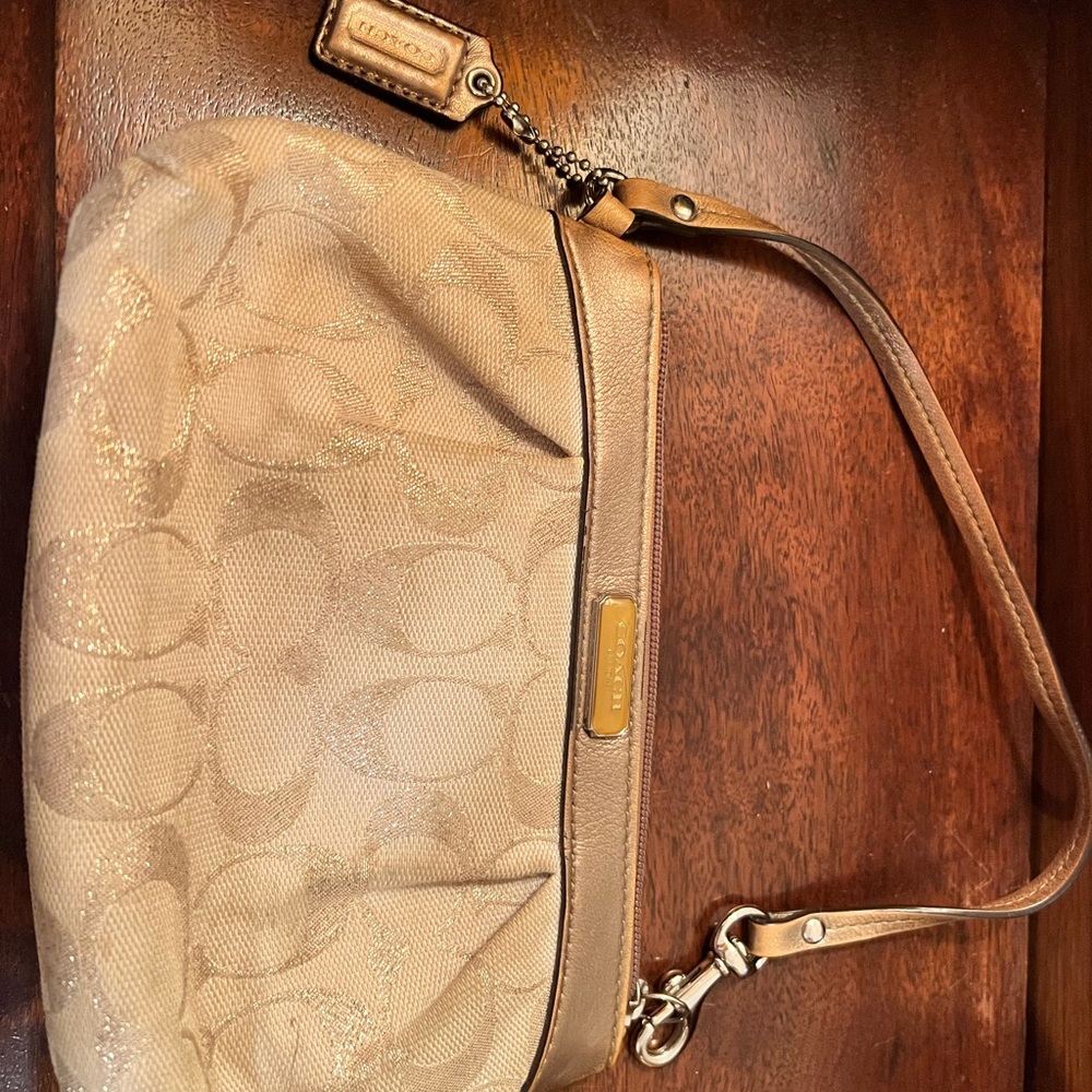 Coach Tan Clutch with Signature Monogram